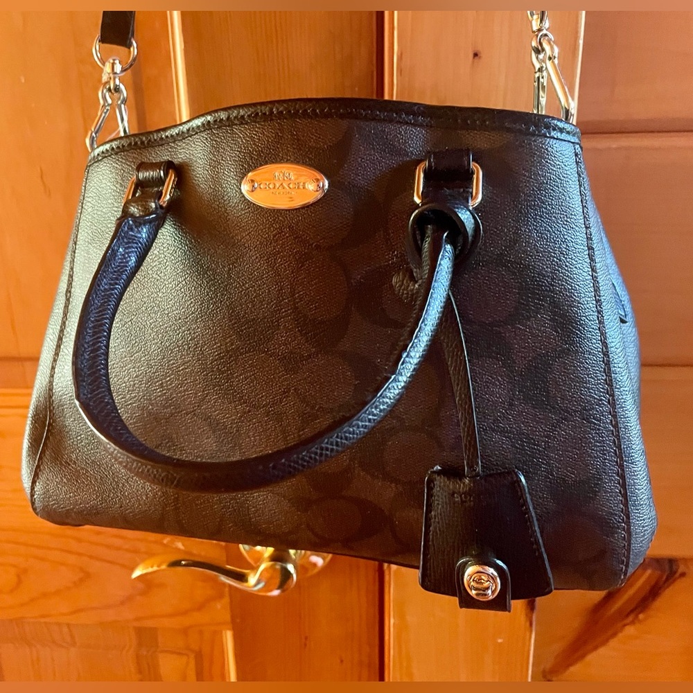 Brown Coach tote with adjustable cross body strap